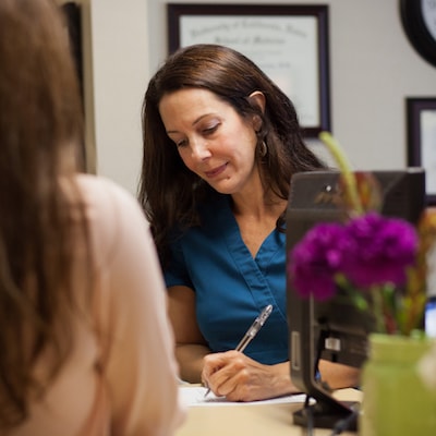 addiction recovery - Image of front desk caring for the needs of a patient